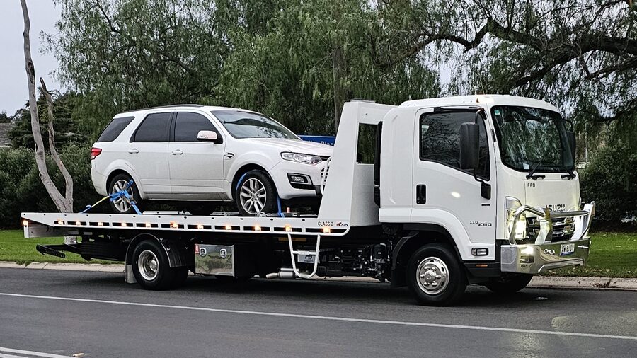 Jarrad Motors Casterton tow truck transporting a vehicle